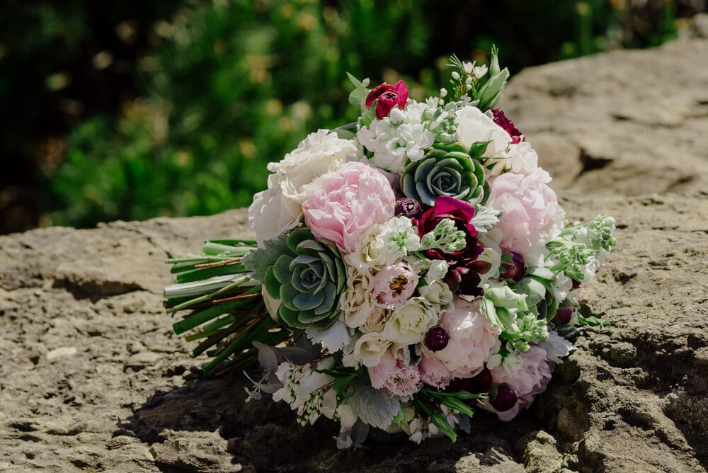 Spring bouquet with succulents and peonies