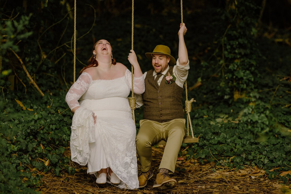 newlywed-couple-swingset-woods