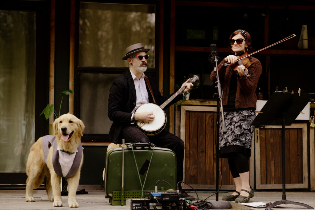 Rainy Day Picnic shares the stage with a golden retriever at the Humboldt Bay Social Club Oyster Beach in Northern California