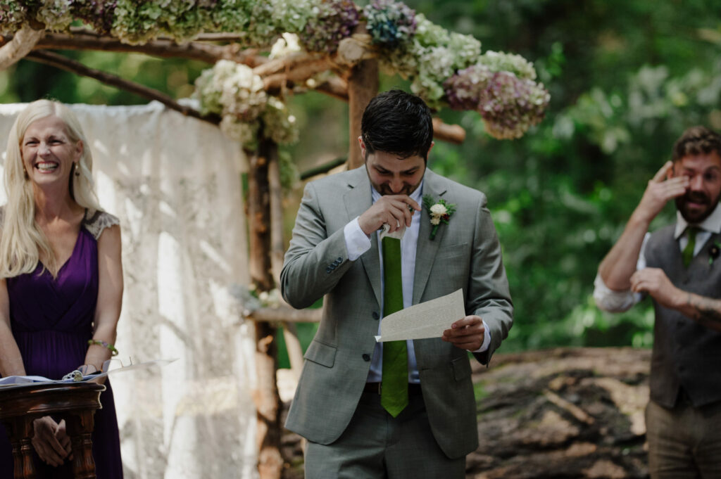 Groom cries during vows at Pamplin Grove redwood forest in Northern California